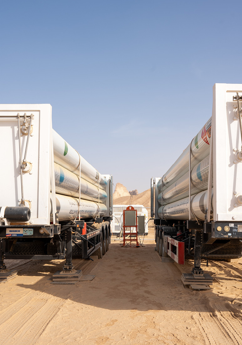 Pressurized hydrogen is transported to the venue by trailer trucks.