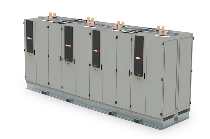 Six gray industrial electrical cabinets with control panels and copper busbars on top, aligned in a row. Six gray industrial electrical cabinets with control panels and copper busbars on top, aligned in a row.