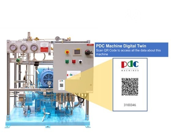 Industrial machine with gauges and control panel; QR code highlighted for digital data access via PDC Machine Digital Twin. Industrial machine with gauges and control panel; QR code highlighted for digital data access via PDC Machine Digital Twin.
