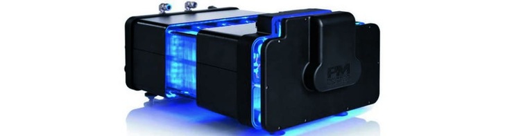 Black and blue hydrogen fuel cell with glowing blue lights, viewed from an angle on a white background.