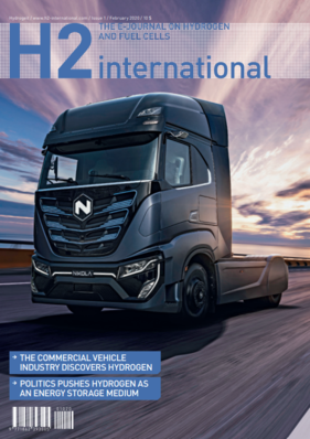 Futuristic black hydrogen truck on highway under dramatic sky, featured on magazine cover "H2 International.