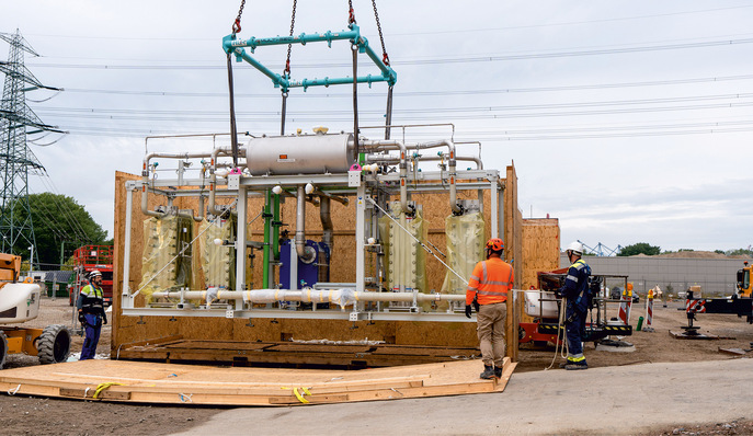 Delivery of the first stacks in sturdy wooden crates. 