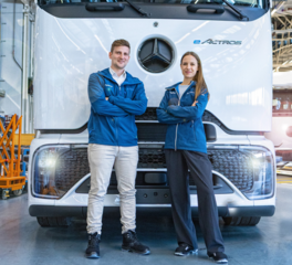 Maximilian Draxler (Geschäftsführer) und Dr. Sara Schiffer (Geschäftsführerin) und vor einem emissionsfreien Lkw aus der Hylane-Flotte